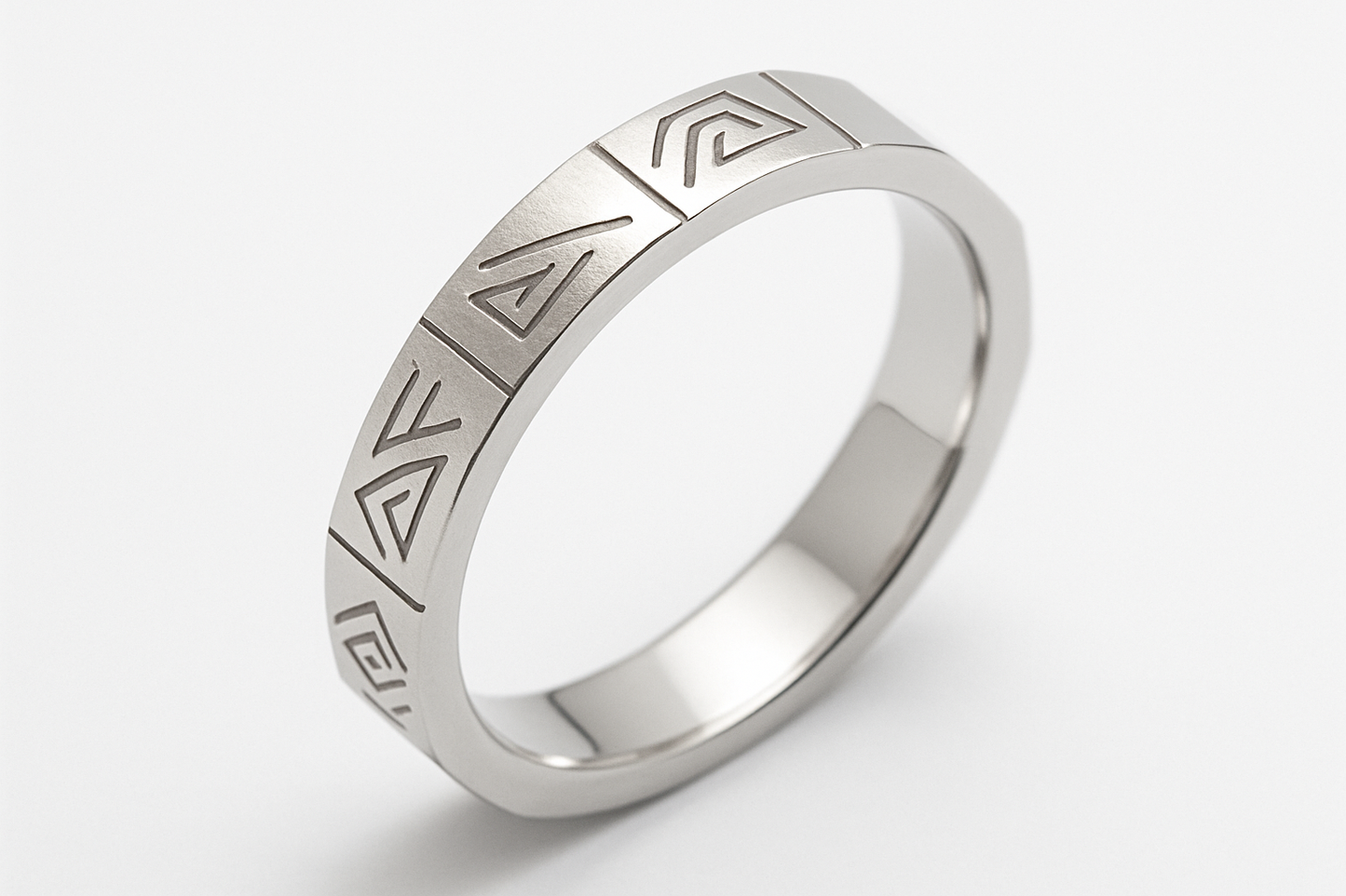 Thin rectangular silver ring with tribal engravings
