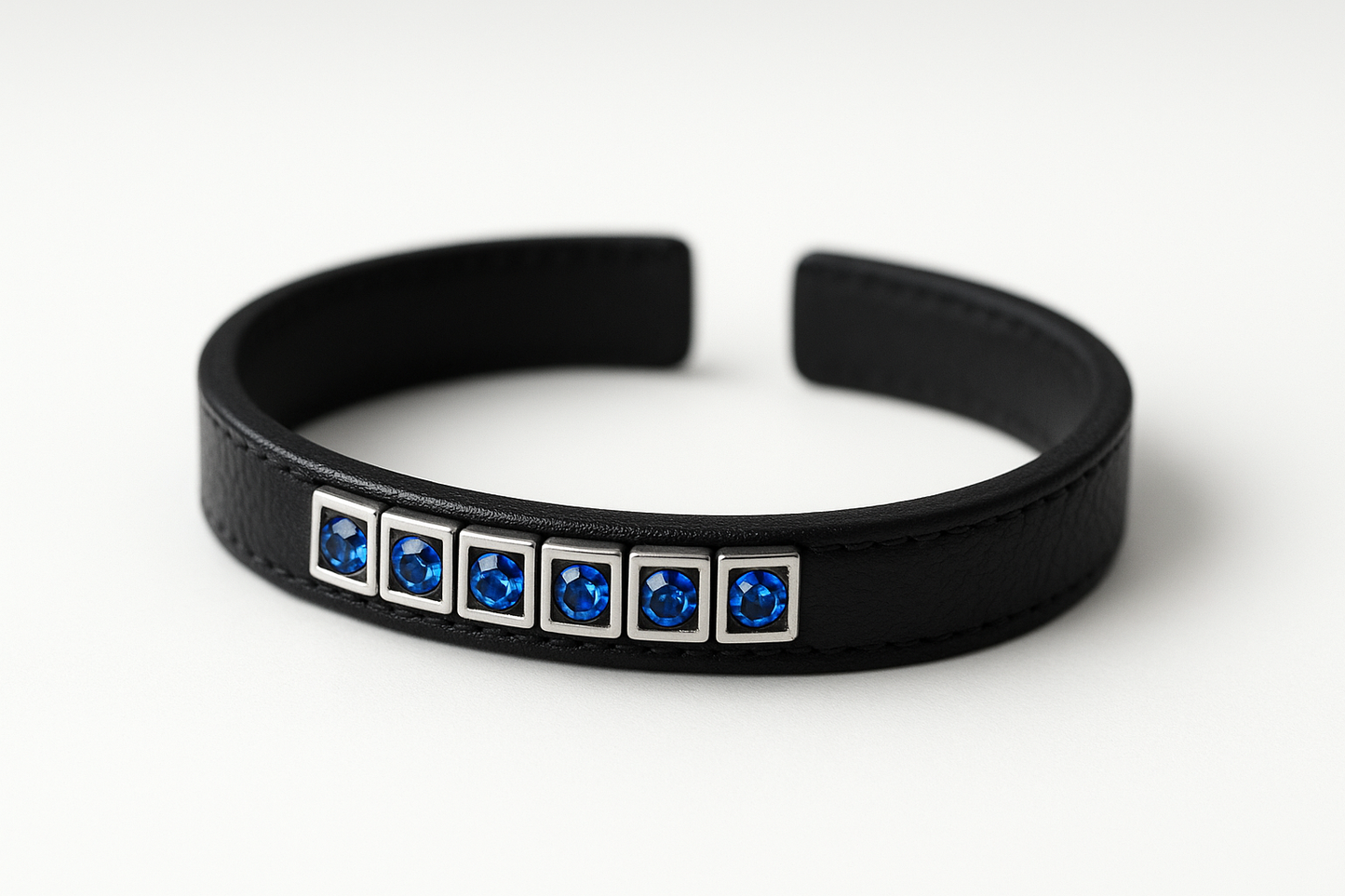 Black leather bracelet with sapphire stones