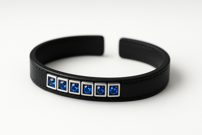 Black leather bracelet with sapphire stones