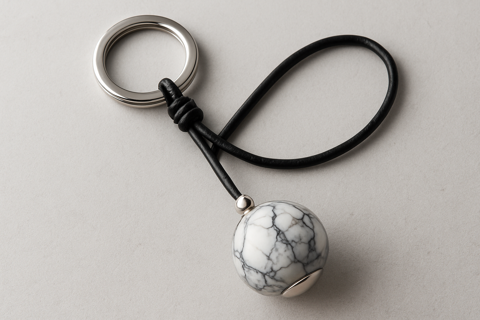 Black silver marble keychain with black leather cord