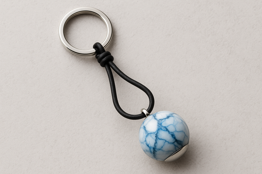 Blue silver marble keychain with black leather cord