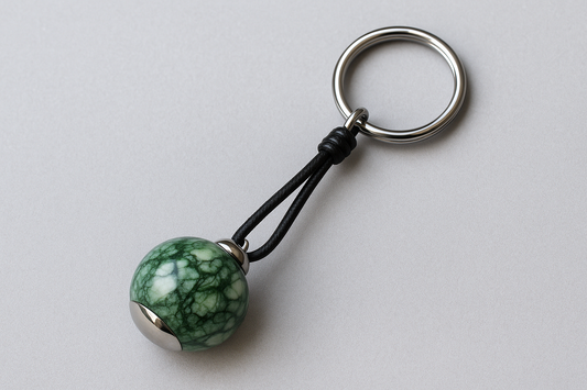 Green silver marble keychain with black leather cord