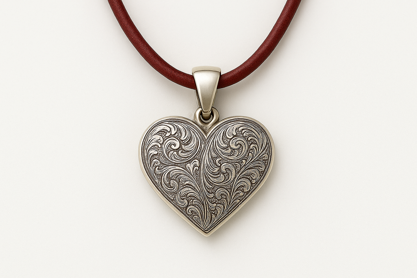 Heart pendant with red leather cord