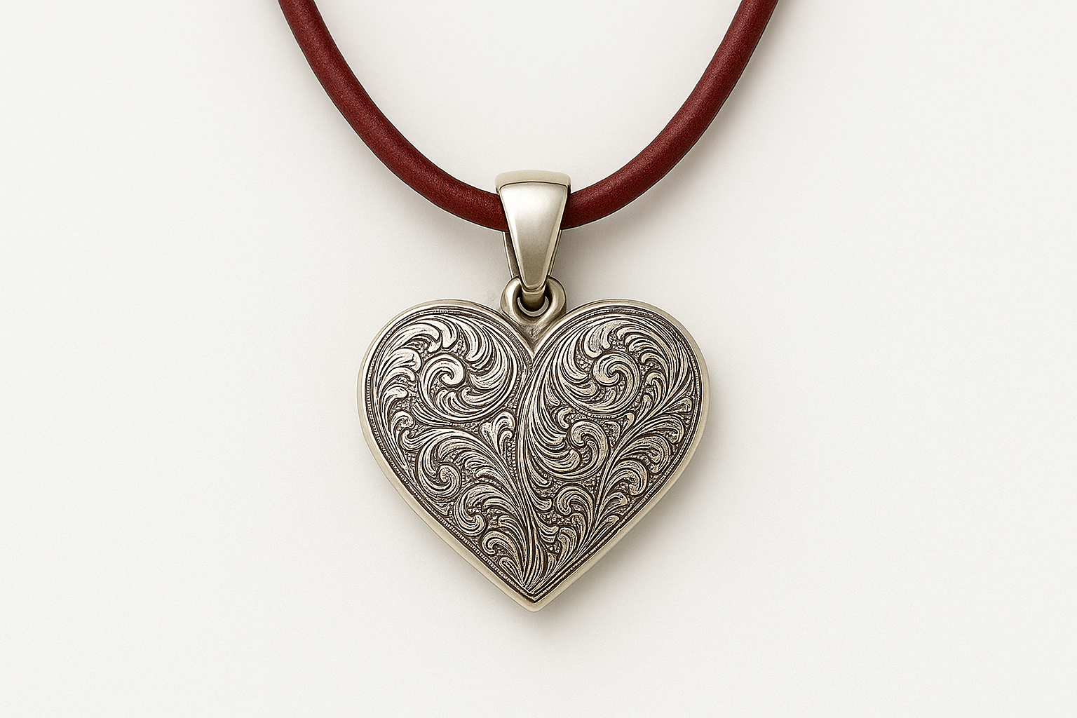 Heart pendant with red leather cord