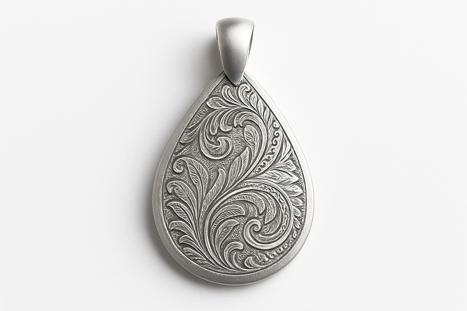 Matte silver pendant with intricate engraving