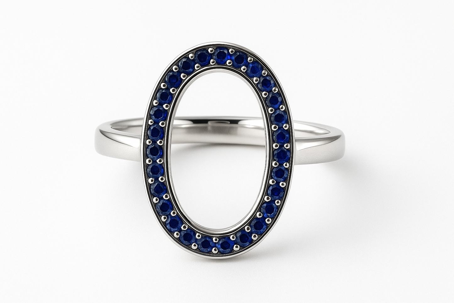 Oval silver ring with sapphire stones