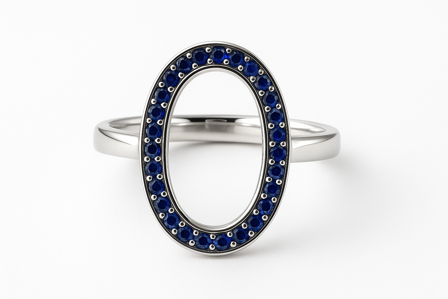 Oval silver ring with sapphire stones