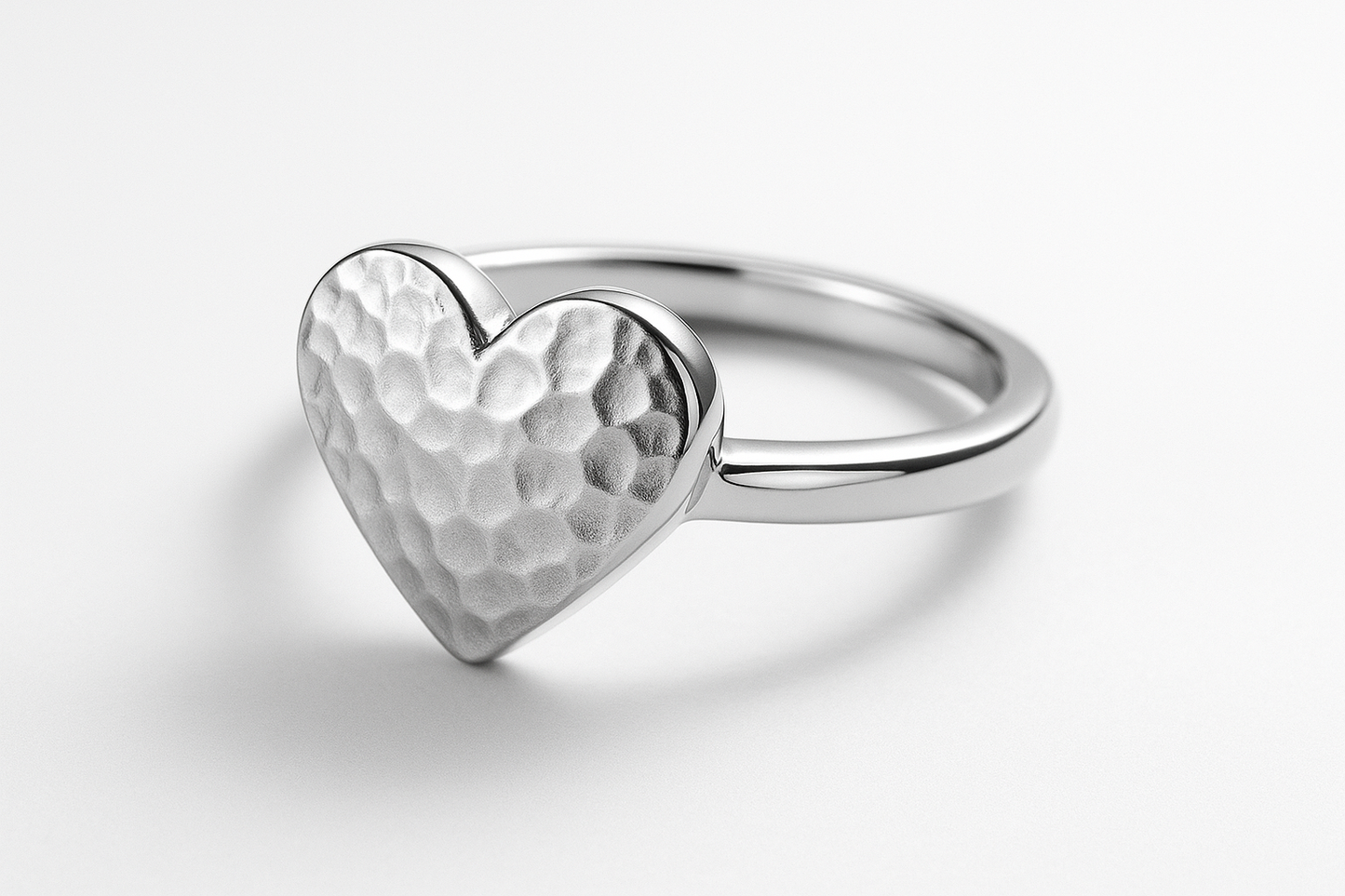 Silver heart ring with hammered texture