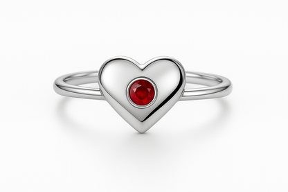 Silver heart ring with red gemstone