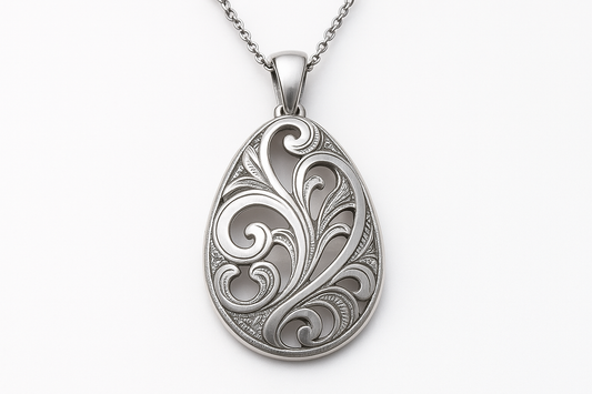 Silver pendant necklace with shiny and matte finishes, engravings, and empty spaces