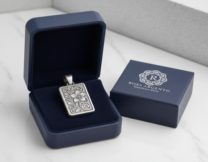 Silver Psr23 pendant on Rosa Argento navy packaging