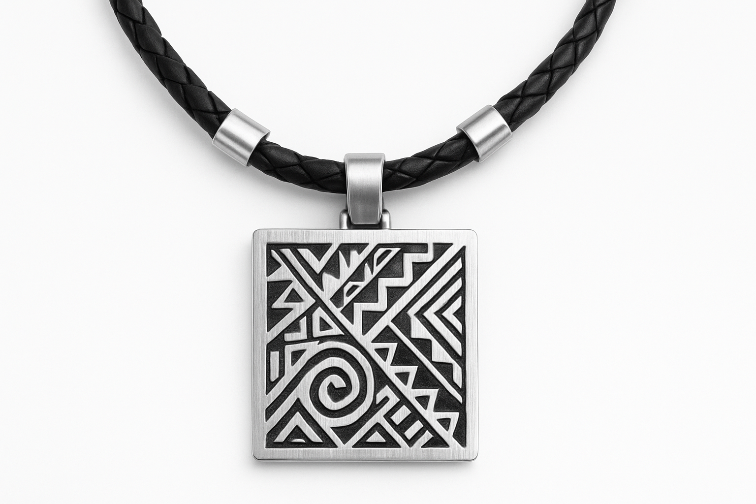 Square silver pendant with tribal pattern engraving on black woven leather