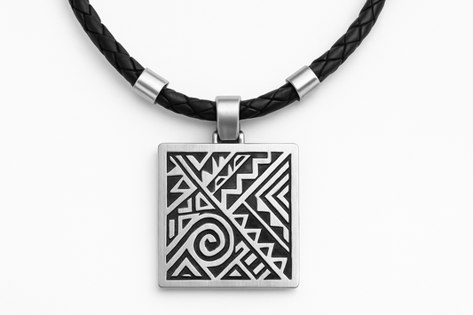 Square silver pendant with tribal pattern engraving on black woven leather