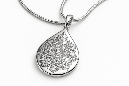 Teardrop silver pendant with mandala design on silver snake chain