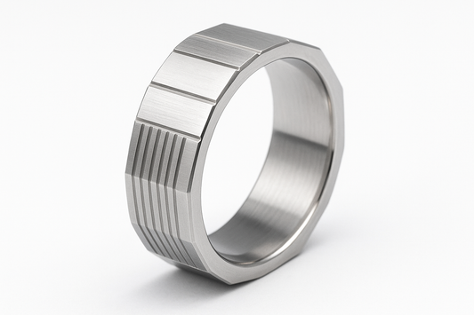 Thin square-edged silver ring with linear engravings