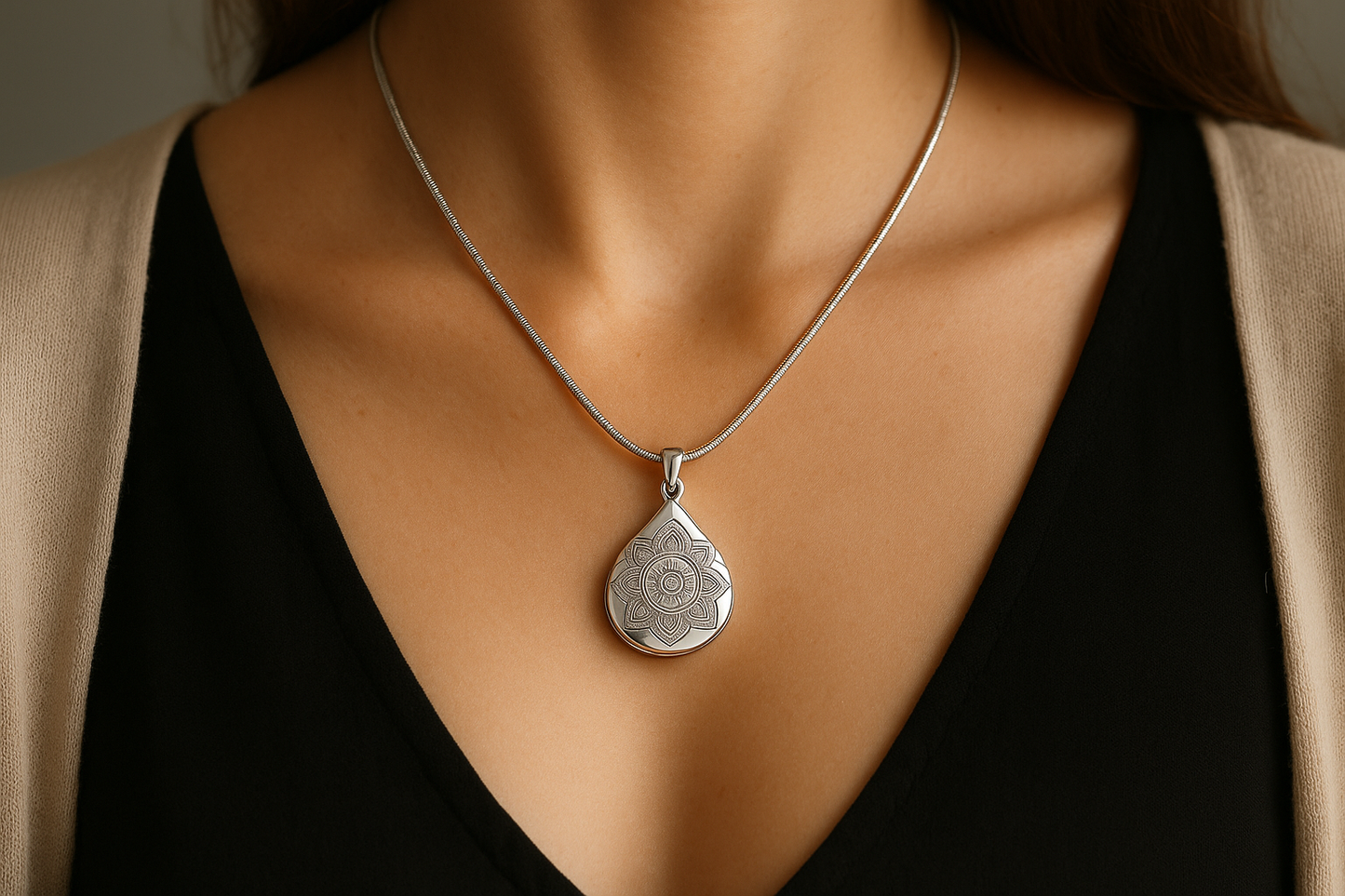 Woman wearing the teardrop mandala pendant